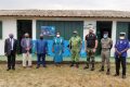 Les officiels devant un bâtiment de la brigade. © D.R.