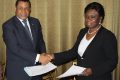 Le Pr Daniel Ona Ondo et la ministre de la Défense nationale, Félicité Ongouori Ngoubili, après la signature officielle des document d'homologation, le 15 mai 2022, à Libreville. © D.R.