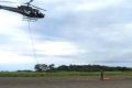 Hélicoptère ZS-RSS avec le système MobileMT sur le projet magmatique nickel-cuivre Nyanga. © D.R.