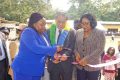 Le ministre de l’Education nationale, Camelia Ntoutoume Leclerc, coupant le ruban symbolique de l’inauguration du bâtiment, le 24 février 2023, à Ntoum. © D.R