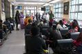 Les rescapés du naufrage de l’Esther Miracle et les représentants des familles endeuillées au guichet spécial du Trésor public, le 27 mars 2023. © D.R.