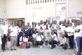 Photo de famille avec les bénéficiaires au siège de l’OIF à Libreville. © D.R.