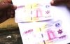 Des billets de banque de très mauvaise qualité retrouvés chez les faussaires. © Gabonreview/Capture d’écran