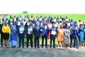 Les récipiendaires posant avec les représentants du ministère du Travail et le Top management de la Comilog, le 19 décembre 2023, à Libreville. © D.R.