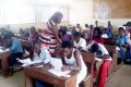 Des élèves de l'école pilote de Bikélé, à Ntoum, en plein examen. © D.R.