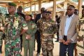 Brice Clotaire Oligui Nguema entouré des membres du CTRI, du gouvernement et directeur général de la SEM à Baniaka. © D.R.