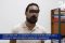 Montré à la télévision : Mehdi Valentin a été interpellé à son domicile de Libreville par des agents de la DGSS. © GabonReview (capture d’écran)