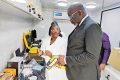 Le ministre Gilles Nembé vérifiant le matériel du laboratoire mobile, le 6 août 2025. © GabonReview