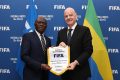 Pierre Alain Mounguengui et Gianni Infantino à Rabat. © Com. Fegafoot