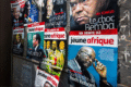 Affiches publicitaires du journal "Jeune Afrique" sur un mur du centre-ville de Kigali, au Rwanda en août 2018. © AFP - Jacques Nkinzingabo