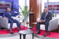Le ministre d'État, ministre des Transports, de la Marine marchande et de la Logistique, le colonel Ulrich Manfoumbi Manfoumbi, interviewé par le journaliste de Gabon 24, Amstrong Agaya. © GabonReview/Capture d’écran