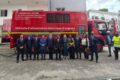 Photo de famille au terme de la cérémonie de remise officielle des clés du véhicules. © D.R.