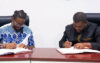 Le CGI et Lord Ekomy Ndong signant le contrat. © D.R.