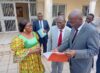 Le ministre de la Justice, Garde des Sceaux, Augustin Emane, scrutant les dossiers relatifs aux juridictions de Mouila. © D.R.