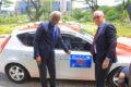 Le maire de Libreville, Eugène Mba, et le directeur général de Moov Africa Gabon Télécom, Zouheir Jorio, posant la première vignette 2026. © GabonReview