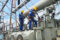 Les techniciens SEEG effectuant des travaux de maintenance du poste source d’Angondjé. © D.R.