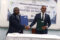 Poignée de mains après la signature entre l’INPTIC et l'ARCEP, le 1er juin à Libreville. © GabonReview