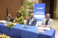 Le représentant du ministre de l’Économie, les présidents de la Cosumaf et de l’AMF-UMOA et le Secrétaire général de la Cima, lors de la signature. © GabonReview