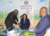 Nadine Nathalie Awanang-Anato installées dans ses fonctions par le directeur de cabinet du directeur général de l’Asecna, Joachim Tchissambou M’boundou.  © GabonReview