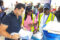 Lola Dulcinette Akoma Ledjele, directrice provinciale des Impôts de l’Estuaire vérifiant les documents d’un opérateur économique, le 19 octobre 2026.  © GabonReview