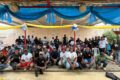 Photo de famille à l'issue de la remise des dons. © GabonReview