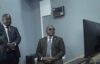 Le ministre d’État chargé des Transports, Ulrich Manfoumbi Manfoumbi, le 12 octobre 2026, derrière des écrans de contôle. © D.R.