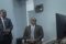 Le ministre d’État chargé des Transports, Ulrich Manfoumbi Manfoumbi, le 12 octobre 2026, derrière des écrans de contôle. © D.R.